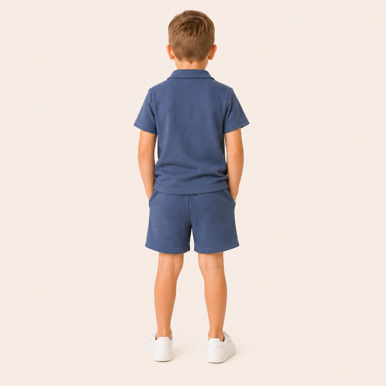 Jongens 2-delige zomerset met wafel polo en short in zeeblauw