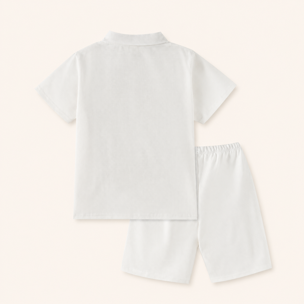 Jongens zomerset 2-delig – witte polo met rits en bijpassende shorts